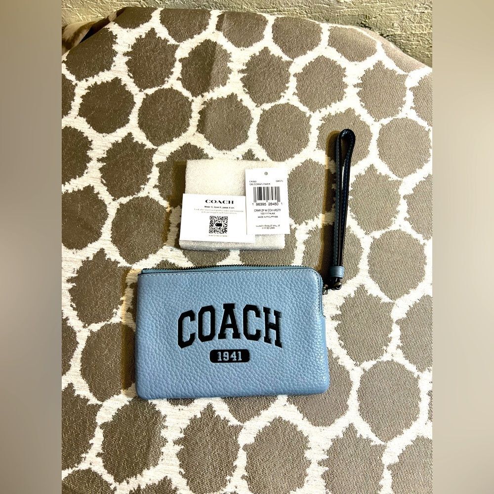 COACH NWT Varsity Blue Wristlet with Zip Closure retails $88 leather colorful